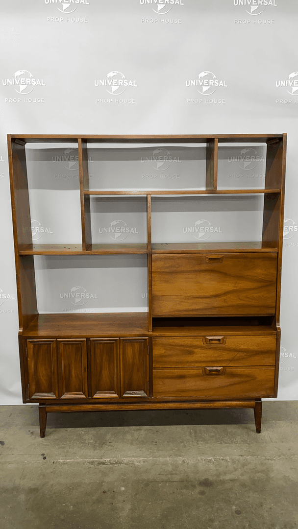Mid-Century Modern Walnut Room Divider or Bookshelf, wall unit, sculptural open shelving for display, drop-front cabinet that can serve as a bar or a built-in desk., Warehouse, Brown, Lt. Brown, Bookcase, Bookcases, Tan, Normal Wear And Tear, 70" H, 60" W, 16" D, UNIVERSAL, Walnut, Brass, 1960's, Danish Modern, 31089212, from Universal Studios Prop House